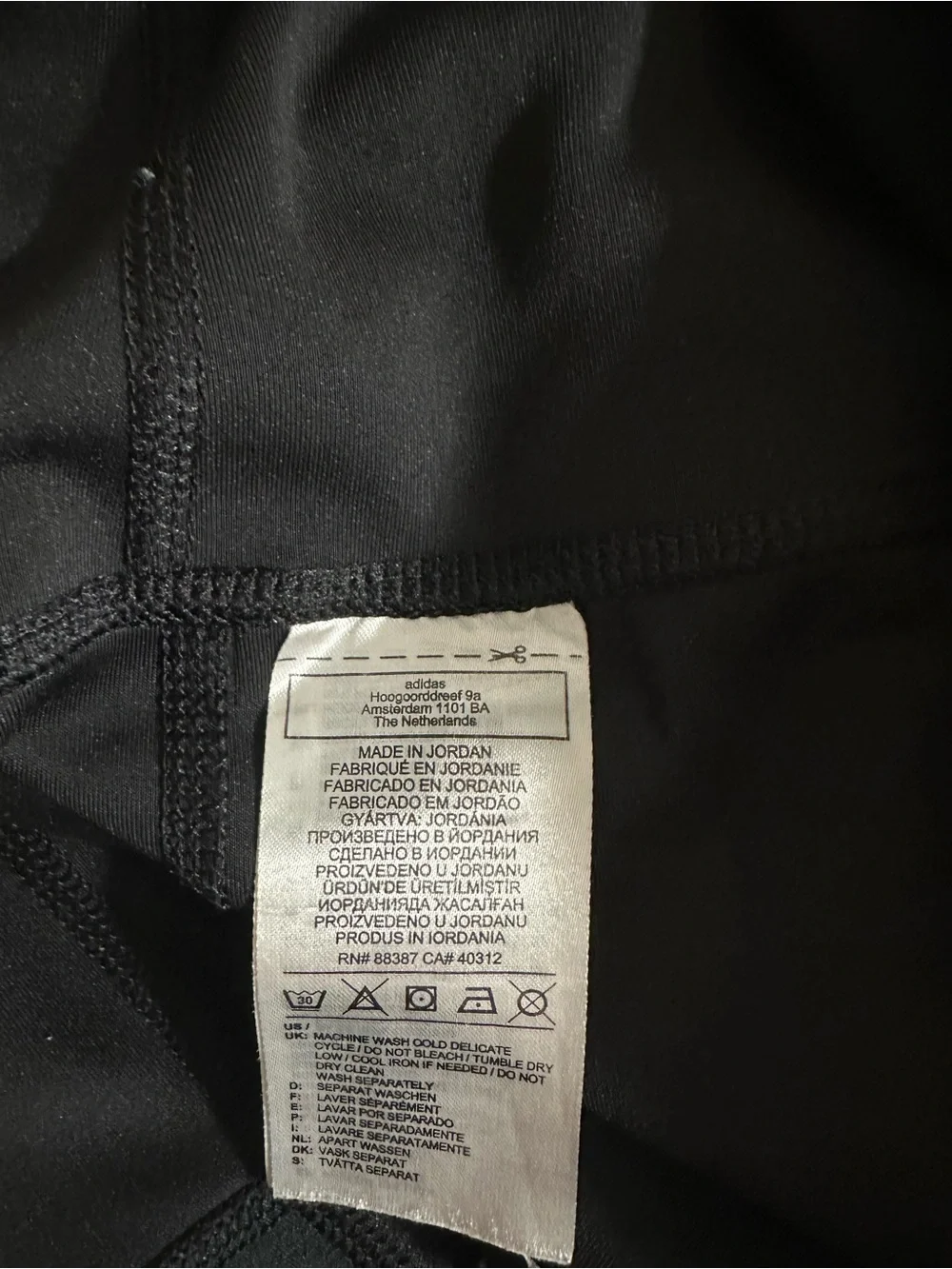 Adidas Black Unisex Athletic Leggings with White Stripes and Pocket